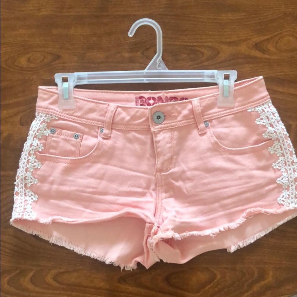 Pink with flower lace on the sides short shorts
